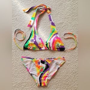 Womens retro string bikini. Bottom size medium. Top size large. Only worn 1 time